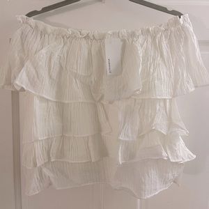 New with tags! White off shoulder ruffle top. Size M